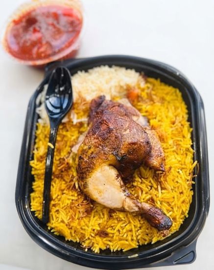 Picture of Half chicken, rice plate with marag
